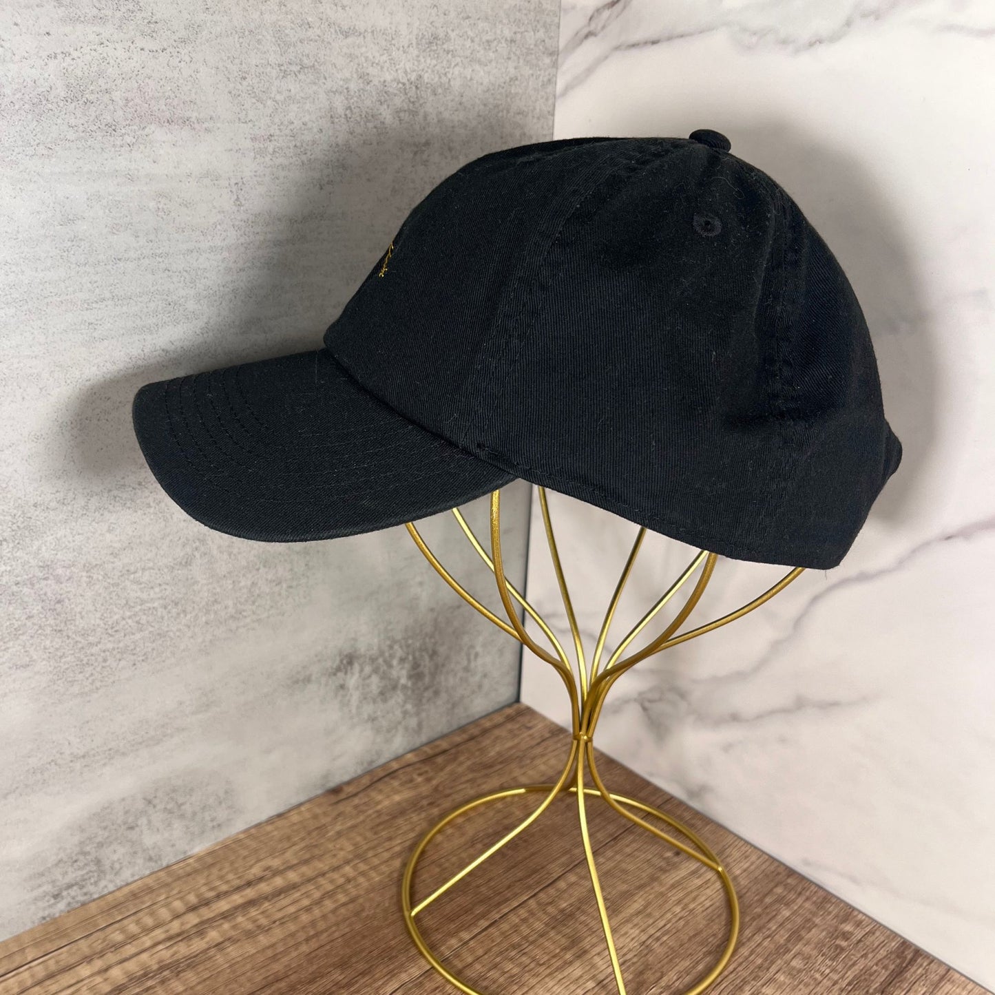 Left-side view of black Cancer constellation embroidered hat