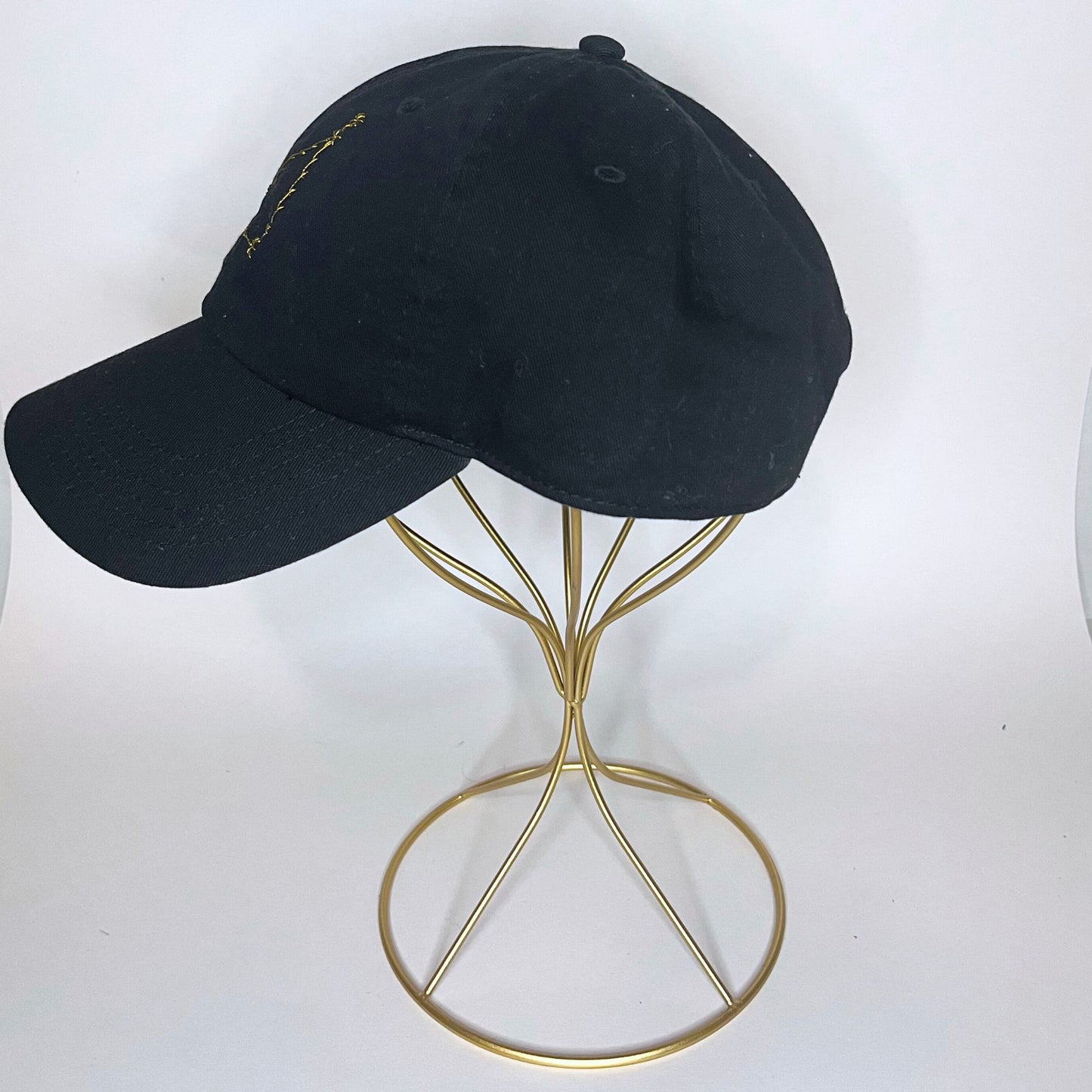 Left-side view of black Cancer constellation embroidered hat