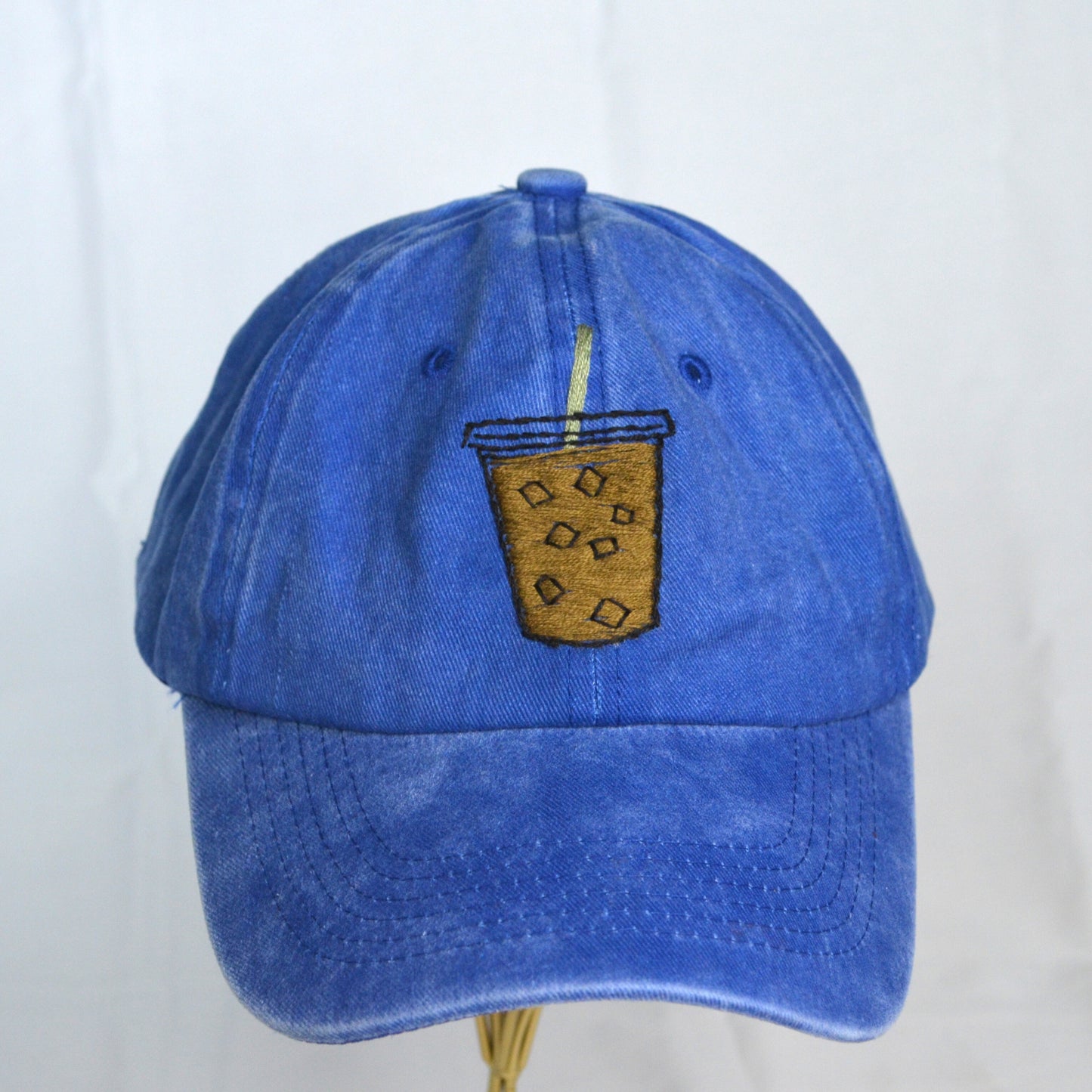 Close-Up of Iced Coffee Embroidery on Cerulean Blue Hat