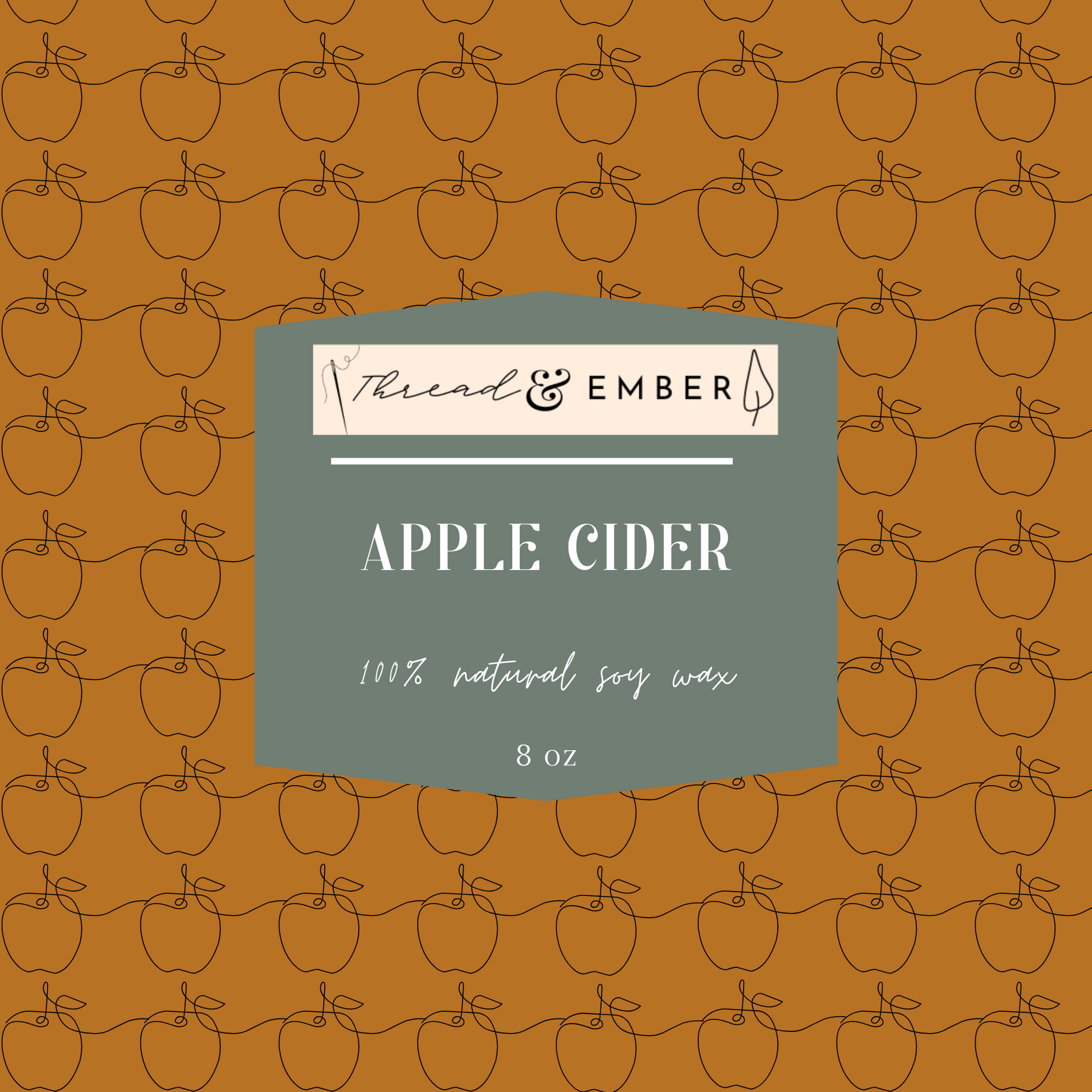 Close-up of the Thread & Ember Apple Cider Candle label, highlighting its 100% natural soy wax composition.